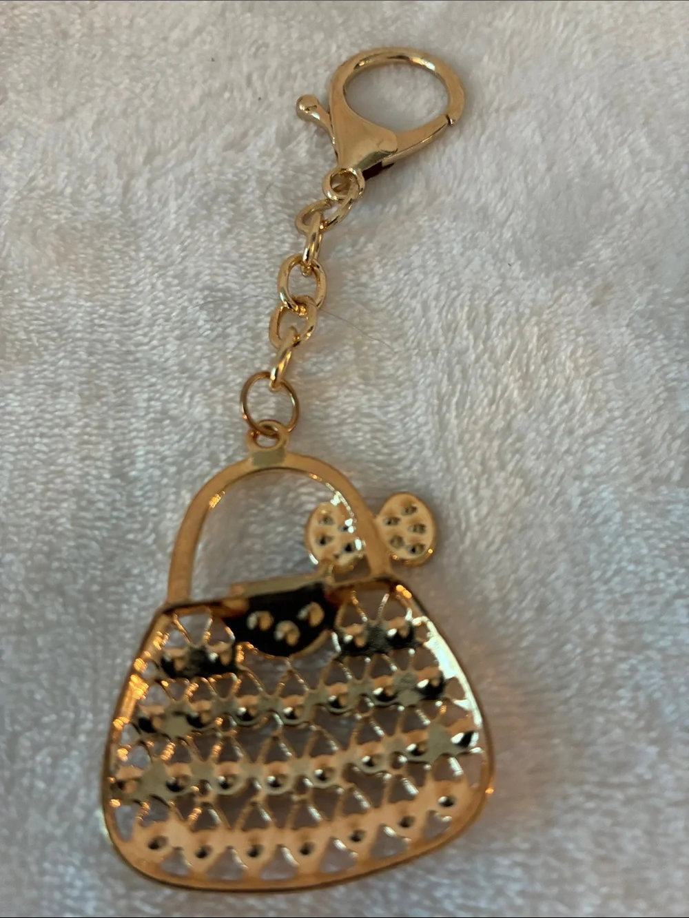 Gold-Tone Purse Keychain with Blue Accents